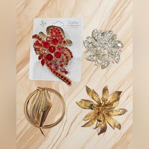BUNDLE OF 4 LARGE BROOCHES (the goldtone is missing one red stone).